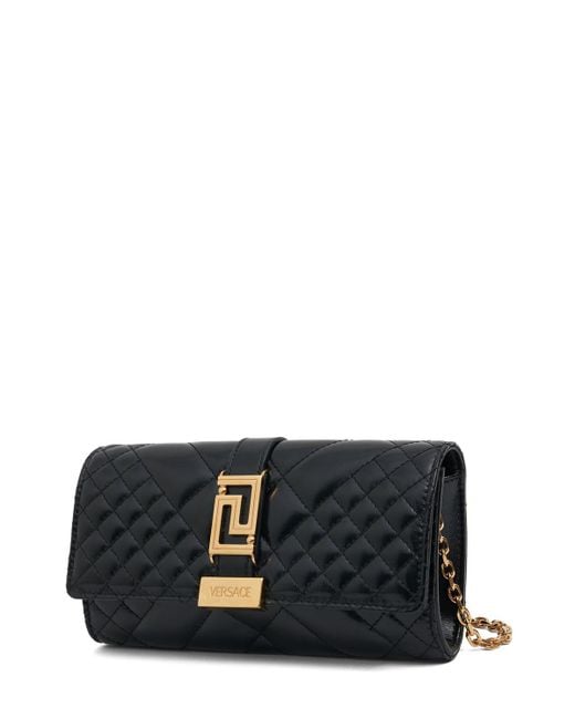 Petit sac porté épaule en cuir matelassé Versace en coloris Black