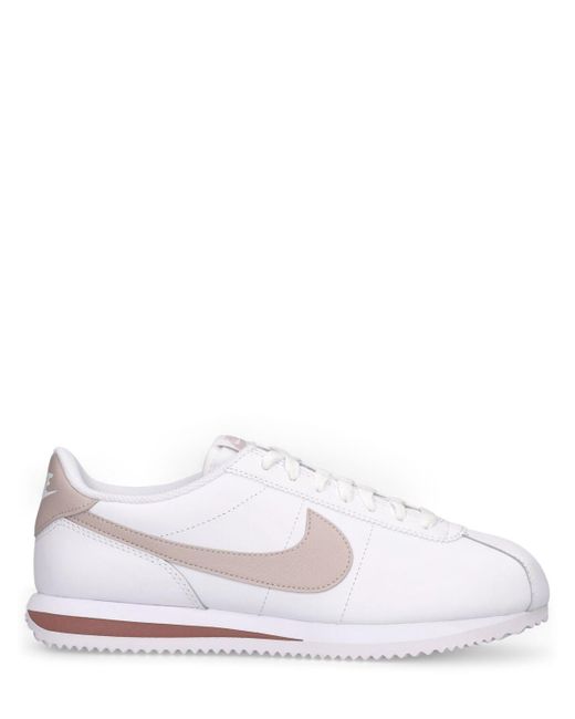 White nike cortez best sale trainers