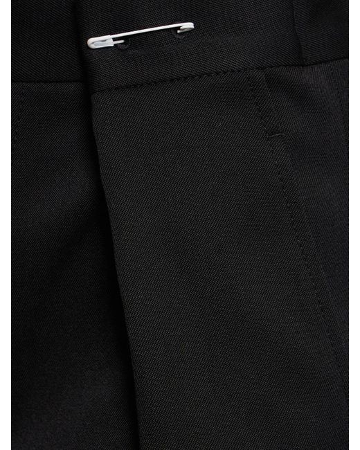 Pantaloni larghi in misto lana di MM6 by Maison Martin Margiela in Black