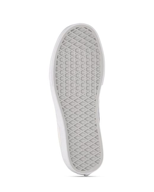 Vans White Classic Slip-on Sneakers