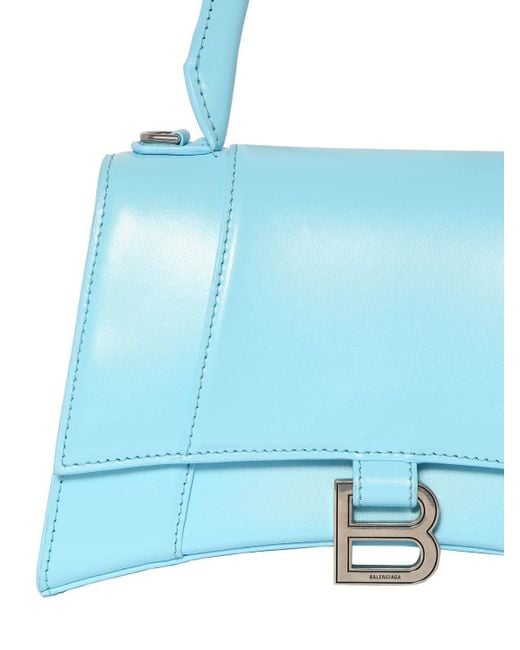Petit sac à main en cuir hourglass Balenciaga en coloris Blue