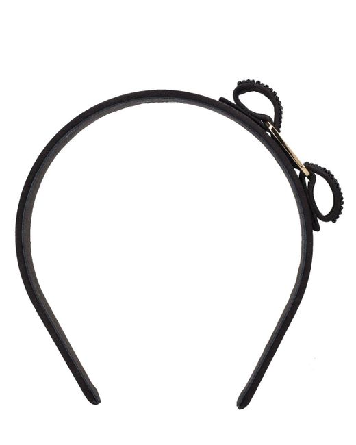 Serre-tête avec nœud baguette Ferragamo en coloris Black