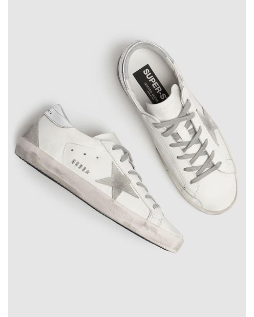 Sneakers en cuir et daim super-star 20 mm Golden Goose Deluxe Brand en coloris White