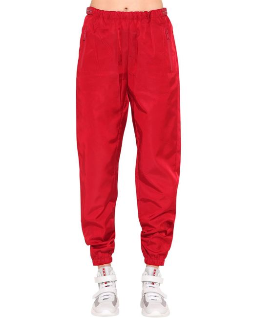 Prada Nylon Gabardine Track Pants in Red | Lyst