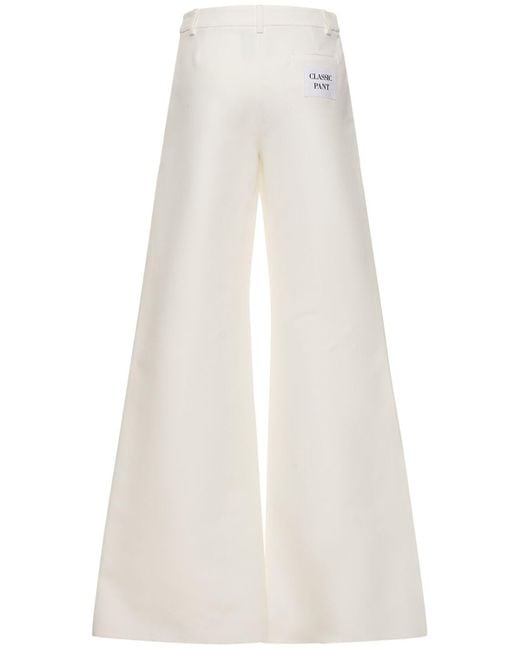 Pantaloni larghi in duchesse di cotone di Moschino in White