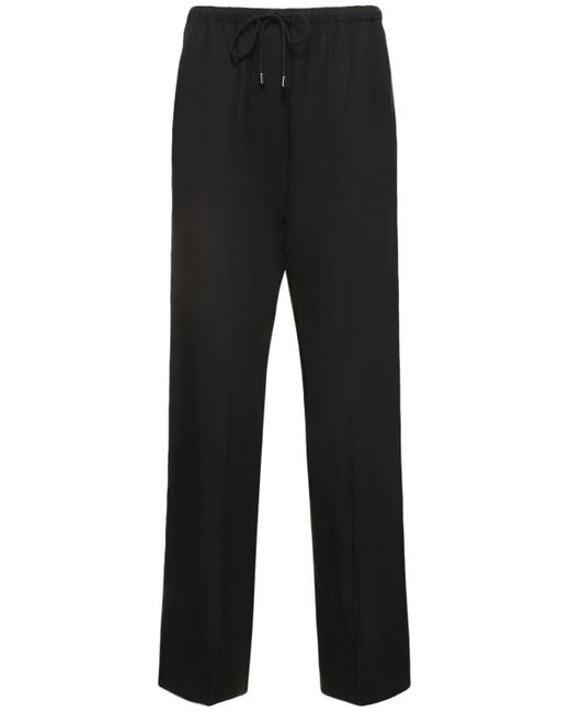 Totême Press-creased Linen Blend Pants in Black | Lyst