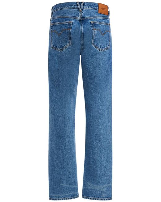 Jeans in denim di cotone di Versace in Blue da Uomo