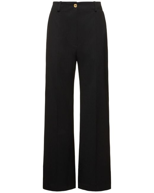 Pantalon ample en sergé de laine mélangée Patou en coloris Black