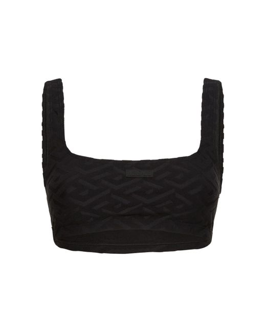 Top bikini in spugna monogram di Versace in Black