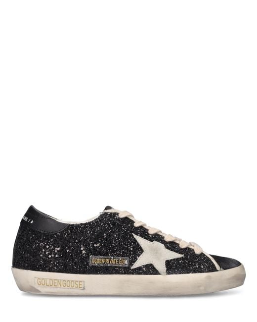 Sneakers lvr exclusive super-star glitter di Golden Goose Deluxe Brand in Black