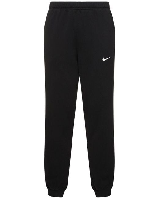 Pantalon en tissu fleece nocta Nike pour homme en coloris Black