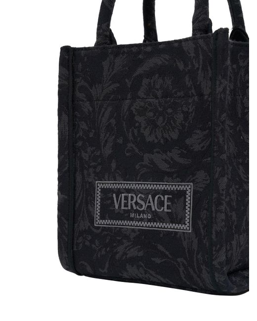 Borsa shopping mini barocco jacquard di Versace in Black