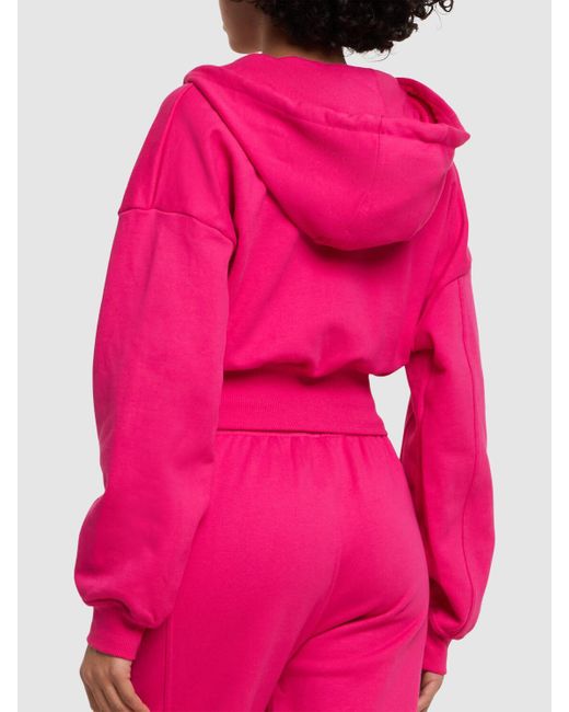 Sweat-shirt court zippé à capuche Adidas By Stella McCartney en coloris Pink