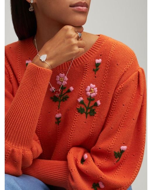 heart bracelet with gucci trademark
