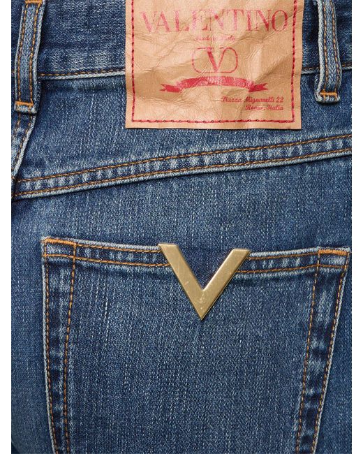 Jeans cropped vita alta in denim di Valentino in Blue