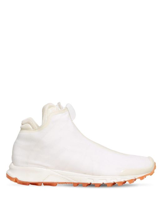 mallas reebok hombre beige