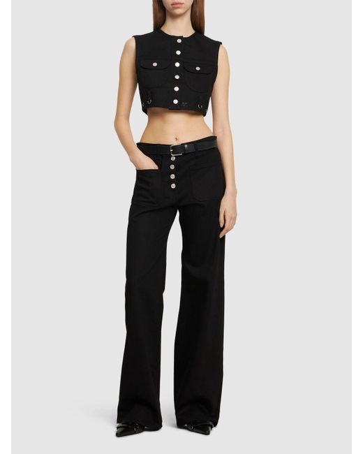 Jeans baggy fit in denim di Courreges in Black