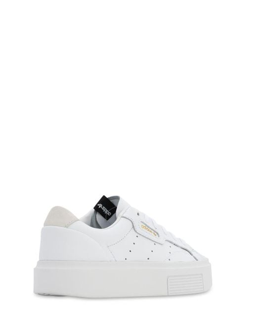 Sneakers bianche super lucide di adidas Originals in Bianco | Lyst