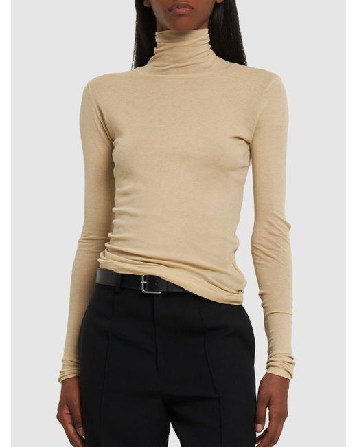 AURALEE High Gauge Sheer Rib Turtleneck Top in Natural | Lyst UK