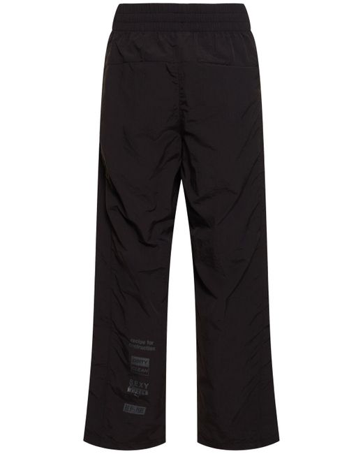 Pantaloni pleasures con logo di PUMA in Black da Uomo