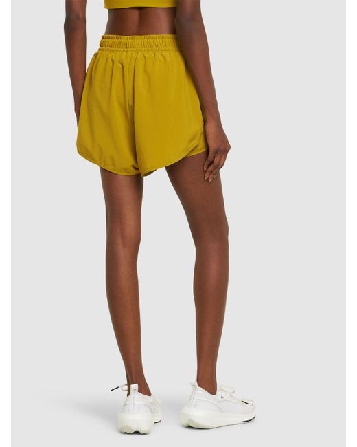 Shorts deportivos de talle alto 2 en 1 Adidas By Stella McCartney de color Yellow
