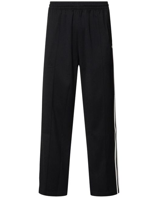 Hombre Pantalones Deportivos Baggy Adidas Originals de hombre de color Black