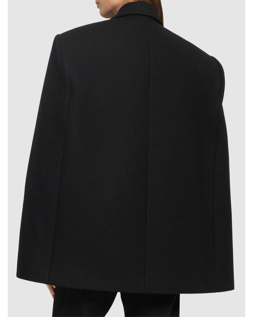 Double breasted cropped wool cape di Wardrobe NYC in Black