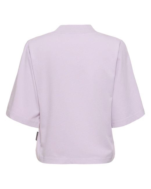 T-shirt cropped in cotone con logo di Palm Angels in Pink