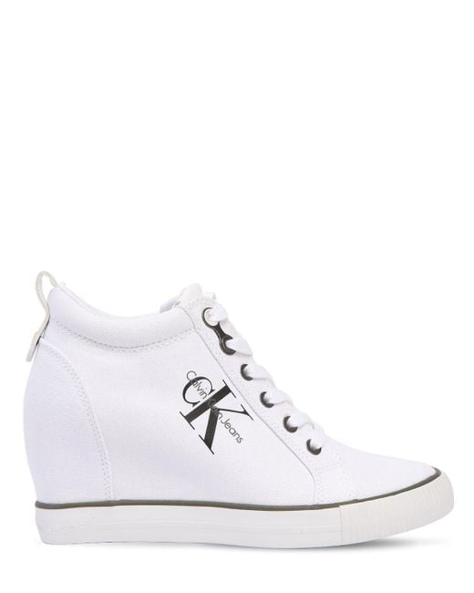 Calvin Klein 70mm Ritzy Cotton Canvas Wedge Sneakers in White | Australia