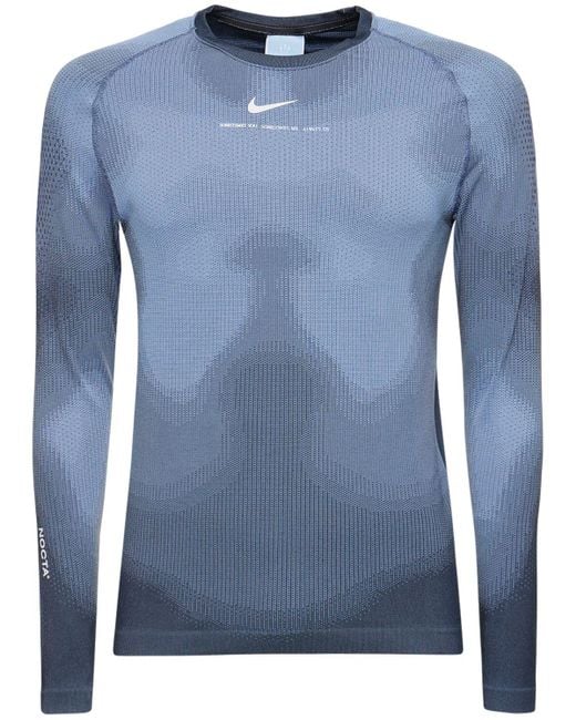 Top térmico nocta engineered Nike de hombre de color Blue