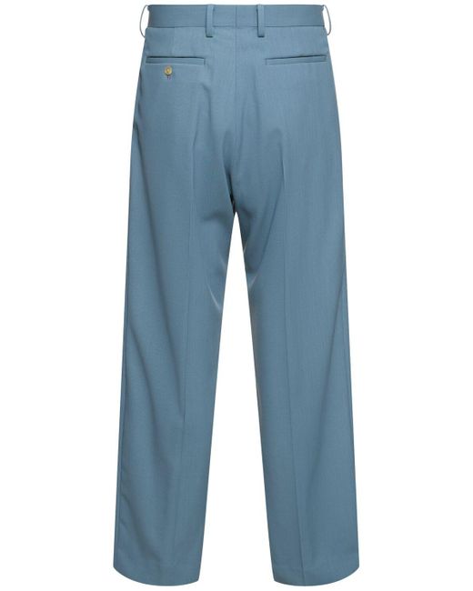 Pantaloni in lana con pinces di Auralee in Blue da Uomo