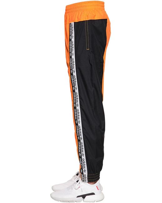 Pantalon De Survêtement En Nylon "Vocala Tp" adidas Originals pour homme en  coloris Orange | Lyst