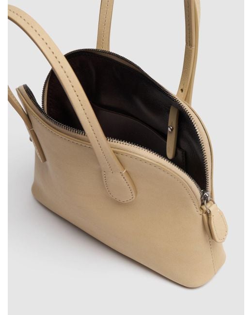 The Row Ingrid Saddle Shiny Leather Bag in Natural | Lyst