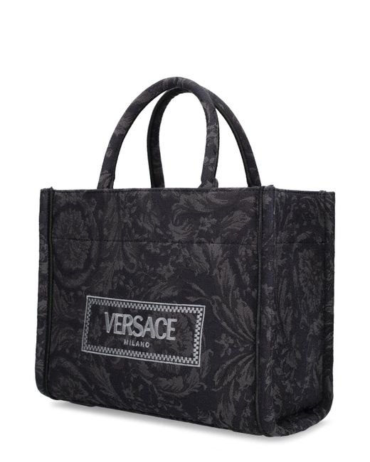 Borsa shopping piccola barocco jacquard di Versace in Black