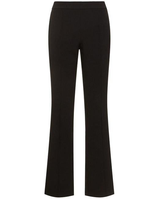 Pantalon ample en tissu technique mélangé Tory Sport en coloris Black
