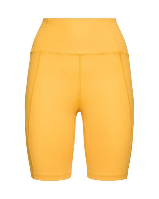Shorts running cintura alta de tech stretch GIRLFRIEND COLLECTIVE de color Yellow