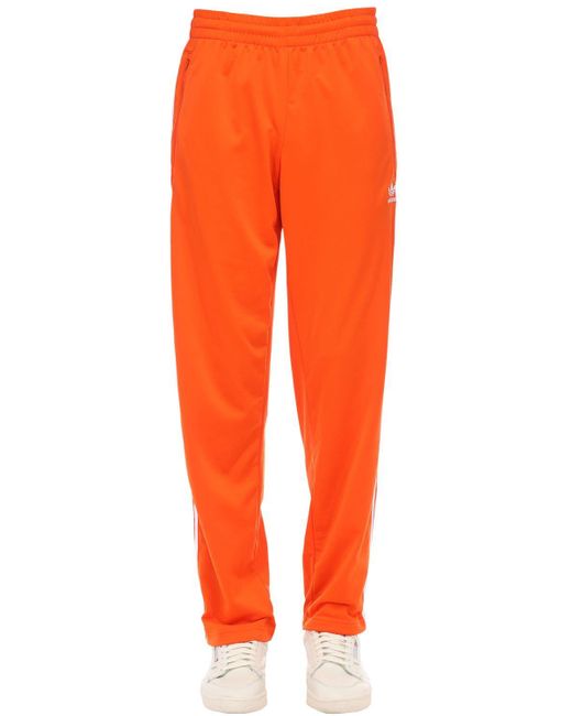 Adidas Originals Orange Adicolor Jersey Trousers for men