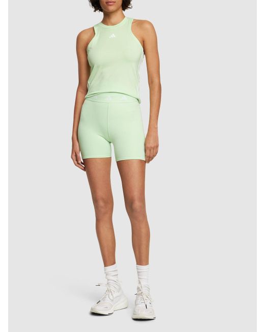 Shorts techfit di Adidas Originals in Green