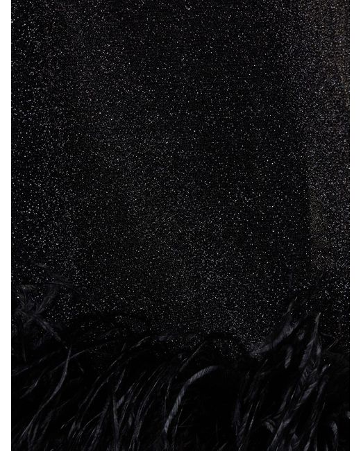 Jumpsuit de lúrex con plumas Oseree de color Black
