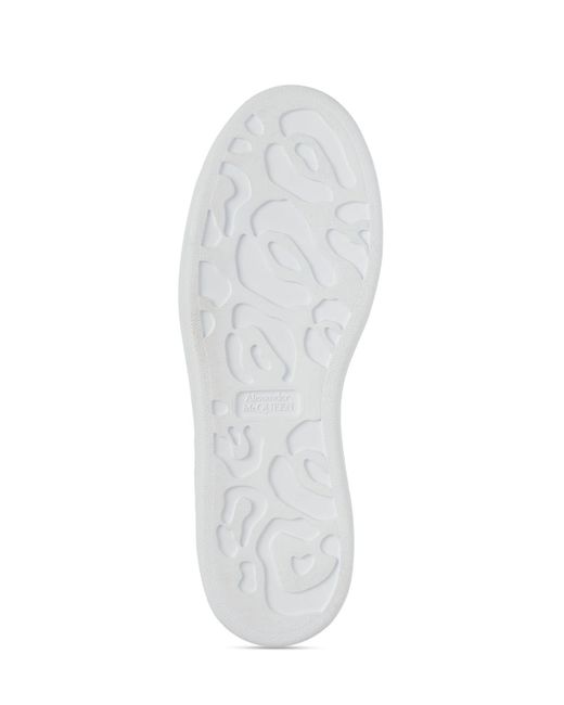 Sneakers in pelle con decorazioni 45mm di Alexander McQueen in White