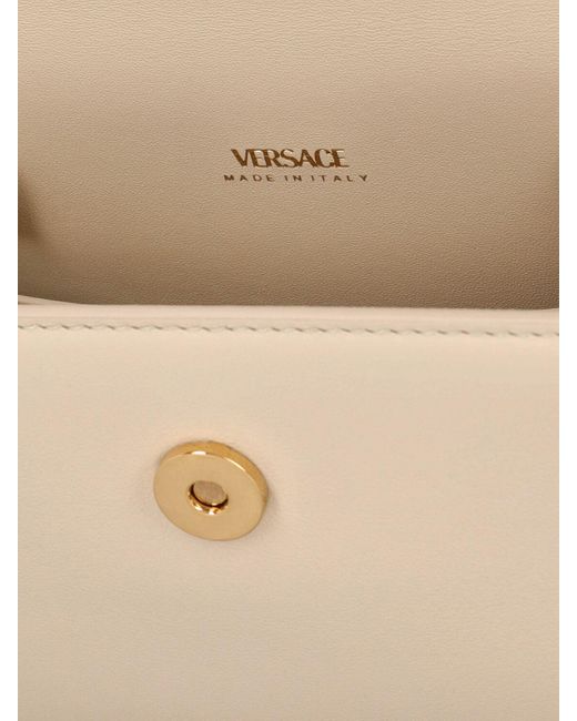 Bolso pequeño de piel con asa Versace de color Natural