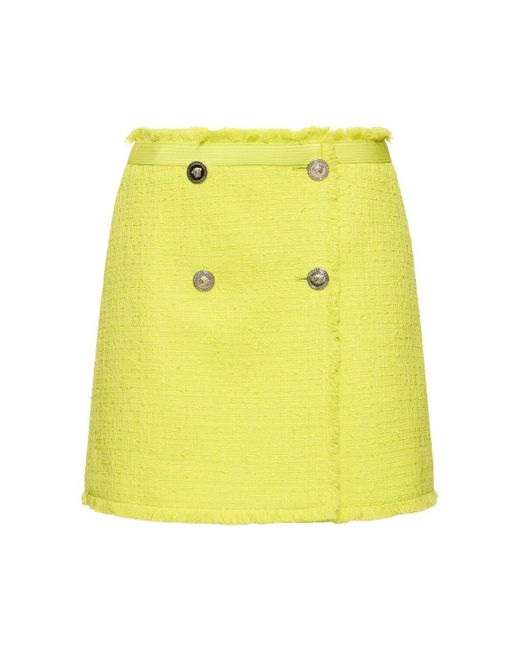 Minigonna in tweed di misto cotone di Versace in Yellow