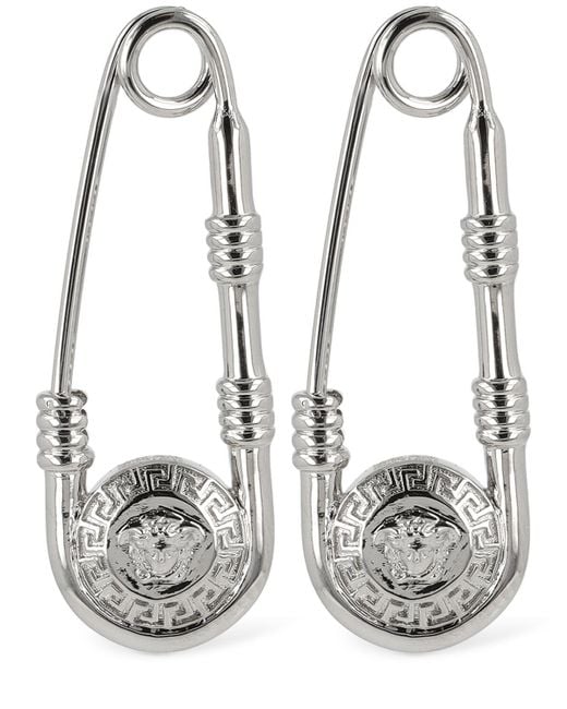 Boucles d'oreilles à logo en métal Versace pour homme en coloris Metallic