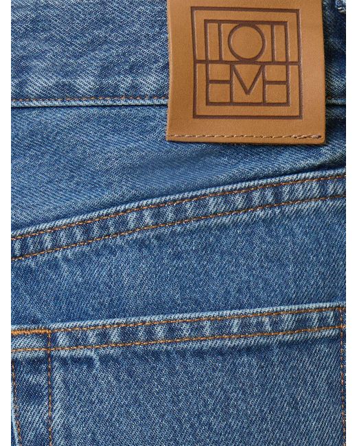 Jeans larghi in denim di cotone di Totême  in Blue