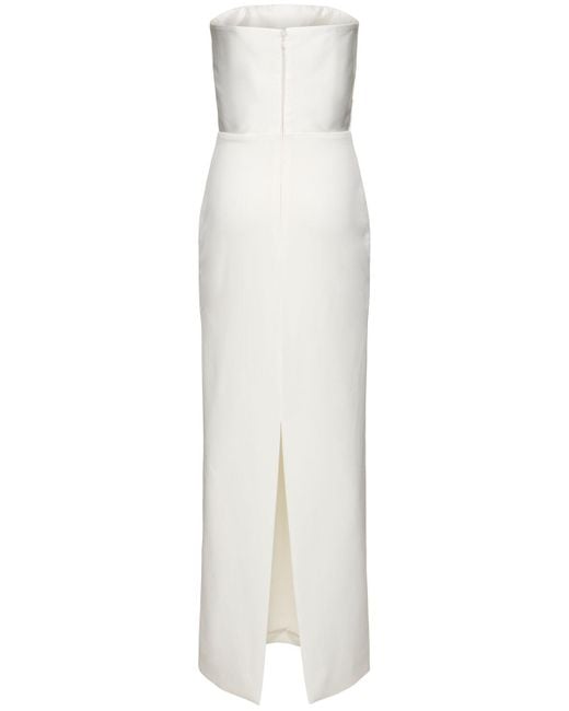 Afra crepe knit strapless maxi dress di Solace London in White