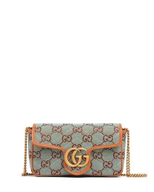 Bolso super mini gg de lona Gucci de color Gray