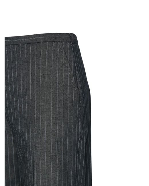 Pantalon en tissu technique stretch à rayures Ganni en coloris Gray
