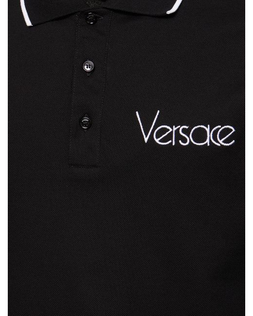 Polo de algodón piqué con logo Versace de hombre de color Black