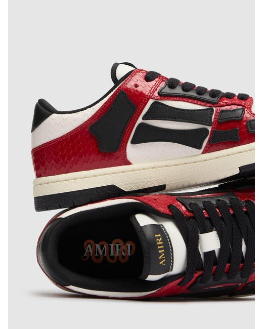 関税送料込み■Amiri■CNY Skel Top Low スニーカー Amiri CNY Skel Top Low Sneakers in Red | FWRD