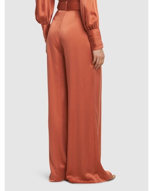 Pantaloni larghi in seta di Zimmermann in Orange